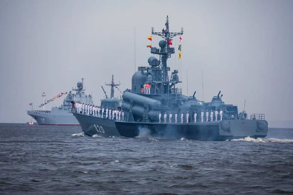 View of Russian Navy, modern russian military naval battleships warships in the row, northern fleet and baltic sea fleet, summer sunny day during the military exercise