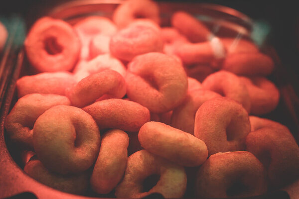 Traditional deep fried russian donuts with white powder in Saint-Petersburg, russian ponchik, pyshka, donut