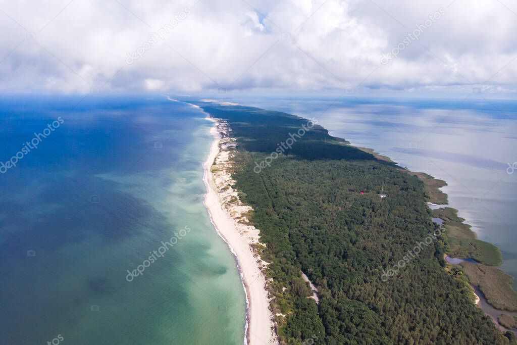 Beautiful aerial drone wide view of Curonian spit, Kurshskaya Kosa National Park, Curonian Lagoon and the Baltic Sea,  Kaliningrad Oblast, Russia and Klaipeda County, Lithuania, summer day