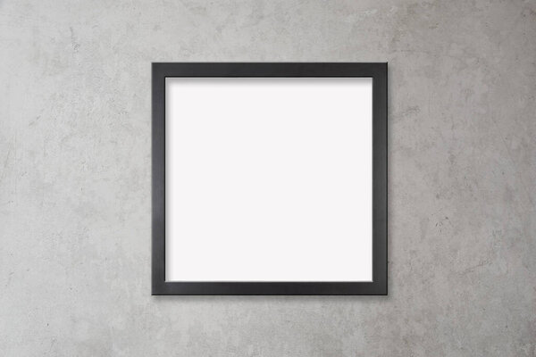 Square black frame on Scandinavian inspired concrete wall with clipping path. Clipping path makes it easy to add your own design inside the frame.