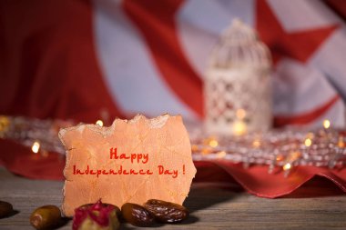 Happy Independence Day. Tunisian flag. Closeup clipart