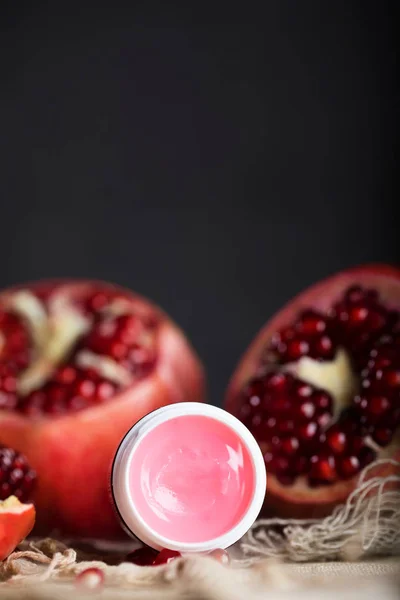 Pomegranate Lip Gloss Wooden Surface Closeup — Stock Photo, Image