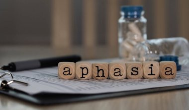 Word APHASIA composed of wooden dices.  clipart