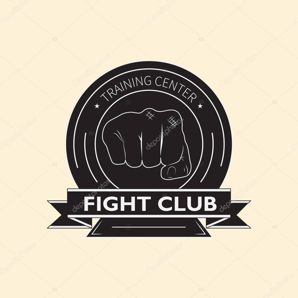 Vector emblem of the fight club with the image of two fists and knights shield. The logo designates the training center for combat training.