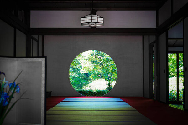 Round window and the fresh green of Meigetsuin