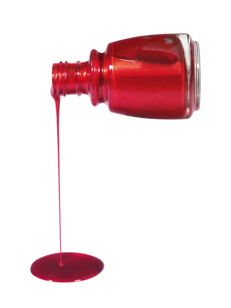瓶からこぼれるルビーネイルポリッシュ — ストック写真