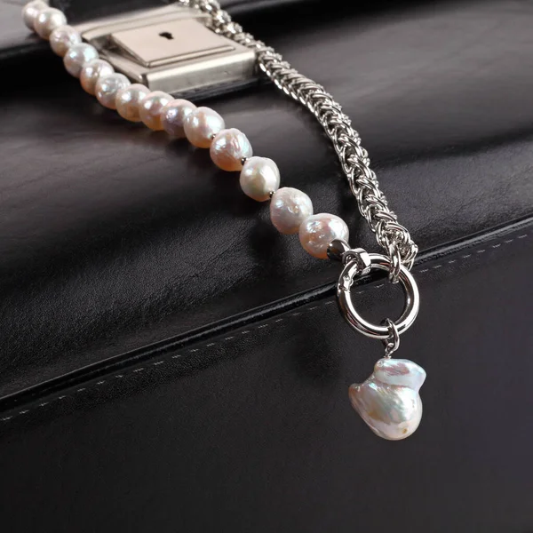 Women Silver Baroque Pearl Necklace Pendant Male Black Leather Briefcase — Stock Photo, Image