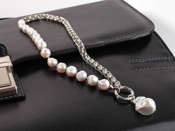 Women Silver Baroque Pearl Necklace Pendant Male Black Leather Briefcase — Stock Photo, Image