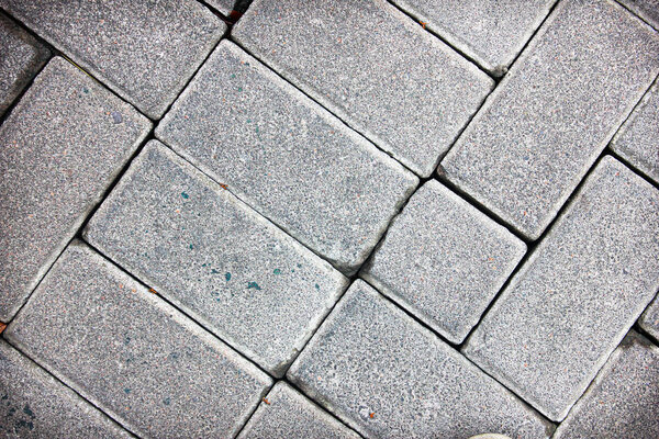 Brick paver background pattern with grey color tones