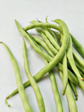 Bir demet taze, sağlıklı, uzun yeşil fasulye. Sağlıklı beslenme ve taze malzemeler için mükemmel..