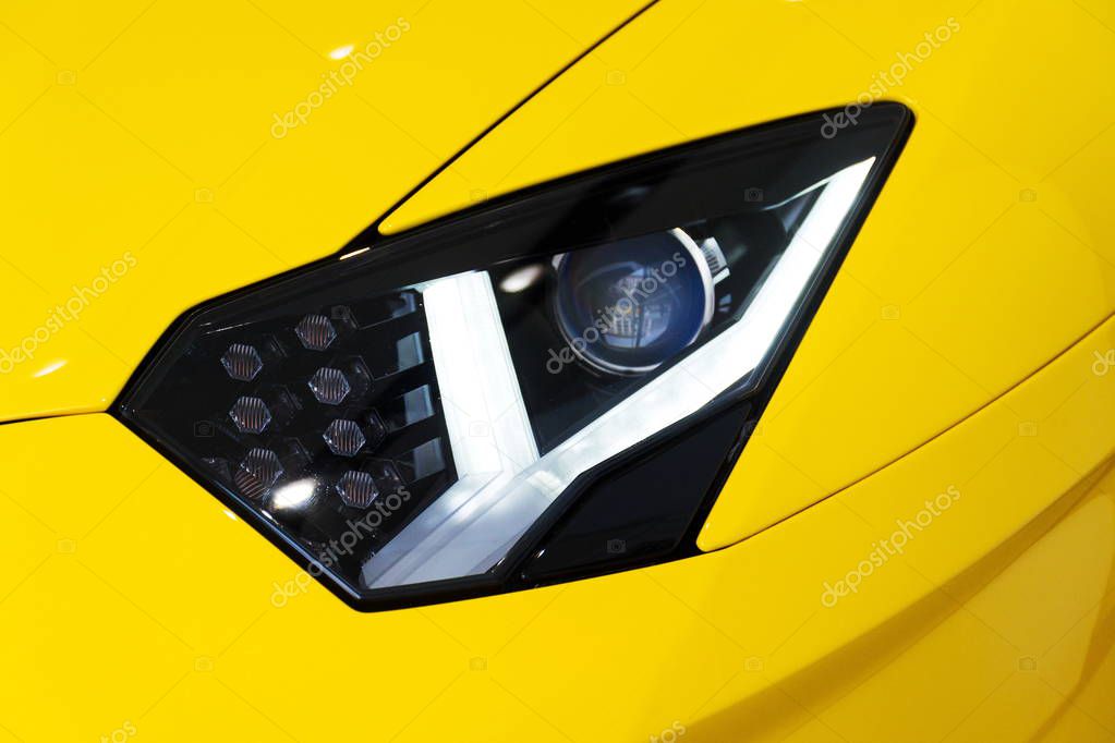 Headlight detail on sports car, Lamborghini Aventador S coupe