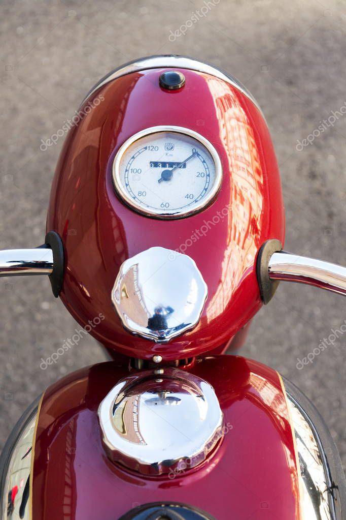 Detail of red vintage motorcycle Jawa 125 produced in former Czechoslovakia
