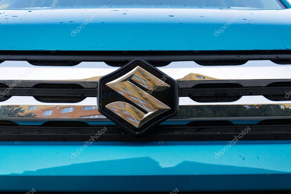 PRAGUE, CZECH REPUBLIC - MARCH 25 2018: Suzuki Motor corporation logo on blue car on March 25, 2018 in Prague, Czech Republic.