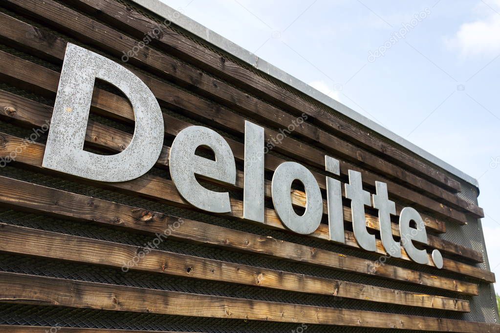 PRAGUE, CZECH REPUBLIC - MAY 19 2018: Deloitte professional service company network logo on the building of the Czech headquarters on May 19, 2018 in Prague, Czech Republic.