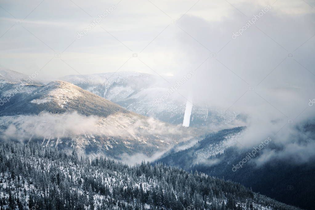 Beautiful snowy foggy winter landscape country, Krkonose Mountains, Czech Republic
