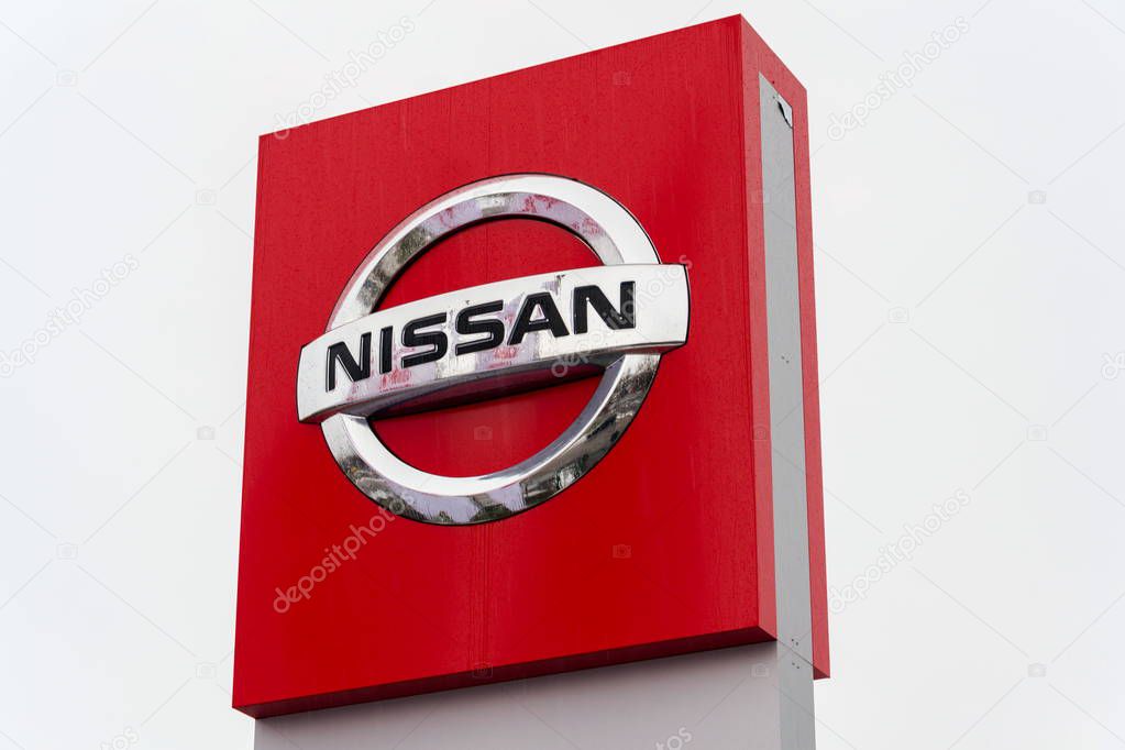 PRAGUE, CZECH REPUBLIC - DECEMBER 2 2018: Nissan motor company logo in front of dealership building on December 2, 2018 in Prague, Czech Republic.