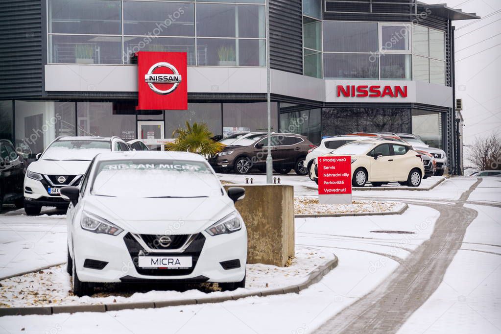 PRAGUE, CZECH REPUBLIC - DECEMBER 2 2018: Nissan motor company cars standing in front of dealership building on December 2, 2018 in Prague, Czech Republic.