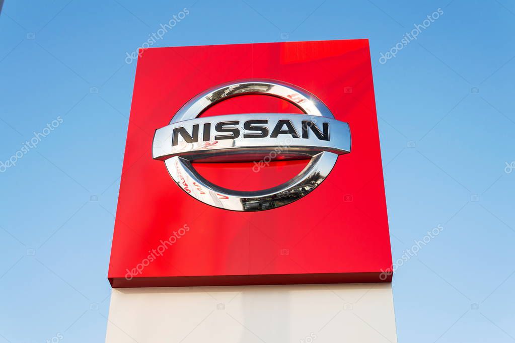 PRAGUE, CZECH REPUBLIC - DECEMBER 13 2018: Nissan motor company logo in front of dealership building on December 13, 2018 in Prague, Czech Republic.