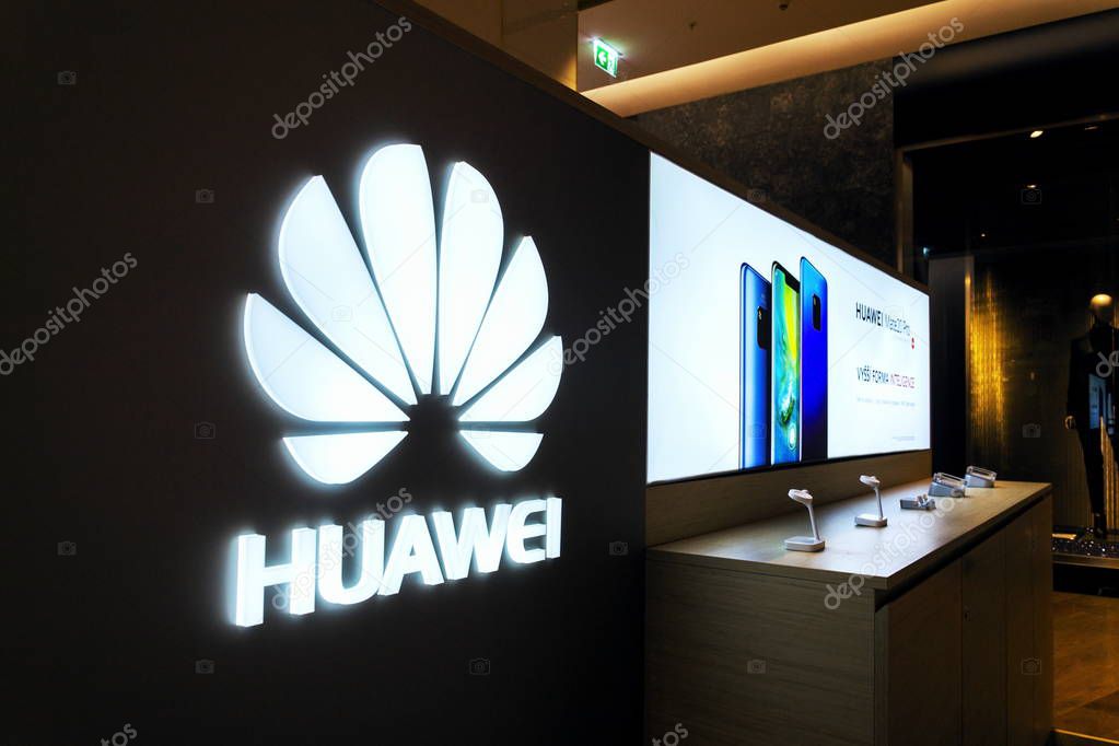 PRAGUE, CZECH REPUBLIC - DECEMBER 14 2018: Huawei telecommunications equipment and electronics company logo on mobile phone shop on December 14, 2018 in Prague, Czech Republic.