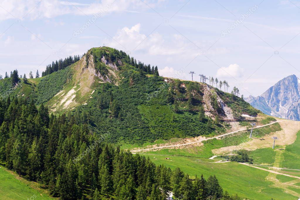 Path to the beautiful Sonntagskogel Mountain in Alps, Sankt Johann im Pongau district, Salzburg federal state, Austria, sunny summer day, clear blue sky, exploration wanderlust concept