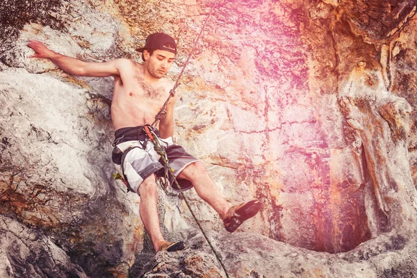 Young Male Climber Hanging Rope Cliff Toned — Stock Photo, Image