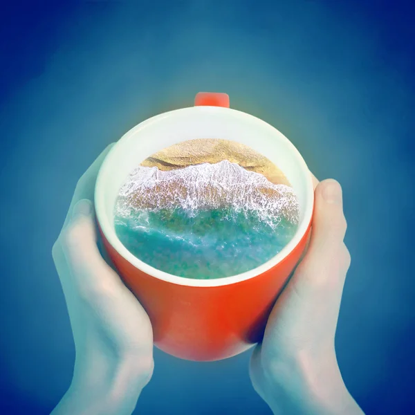 Cup of coffee with the sea inside. Creative idea