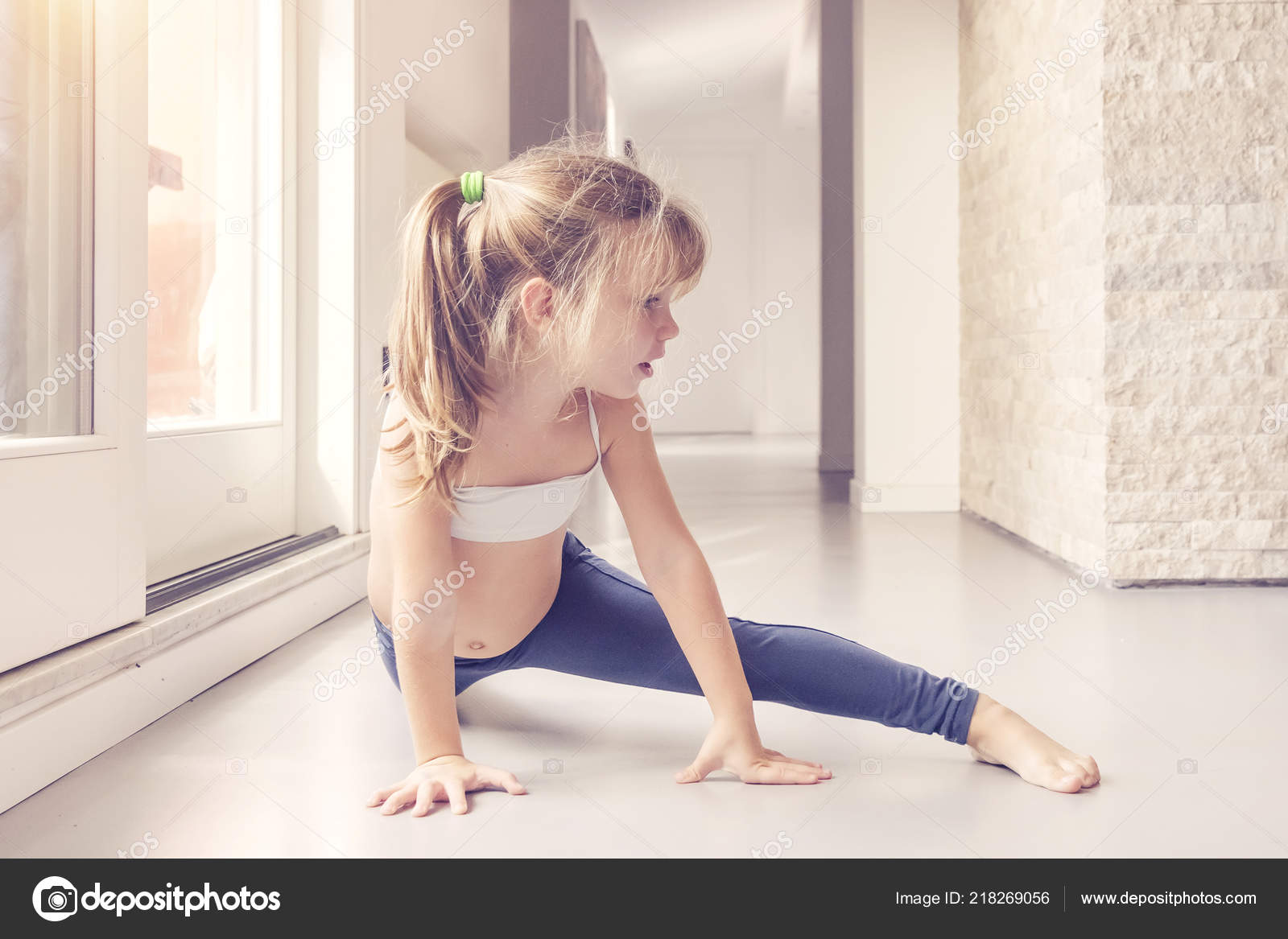 Little Blond Girl Doing Stretching Exercises Room Window — Stock