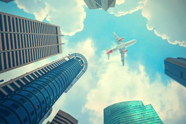 Gökdelenler üzerinde uçan uçak tabandan tavana görünümünü