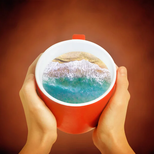 Cup of coffee with the sea inside. Creative idea