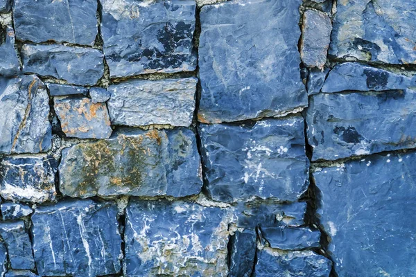 Blue stone wall, background, texture
