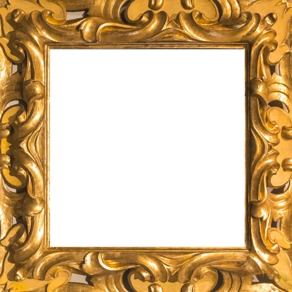 Gold wooden square frame with carved ornament. Isolated on white