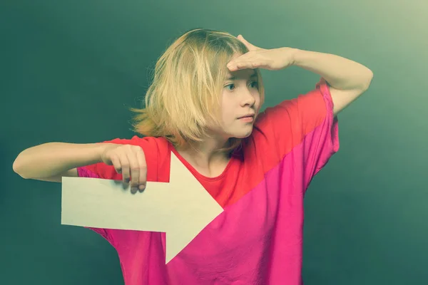 Blonde Girl Teenager Red Blouse Holding White Arrow Pointing Right — Stock Photo, Image