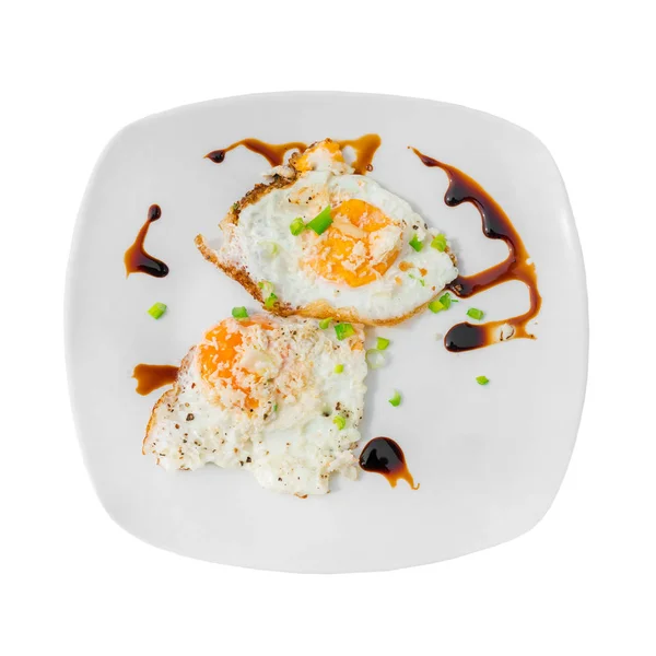 Fried Eggs Green Onions Sauce White Plate Isolated — Stock Photo, Image