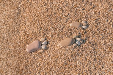 Taş kum üzerinde yapılan ayak izi