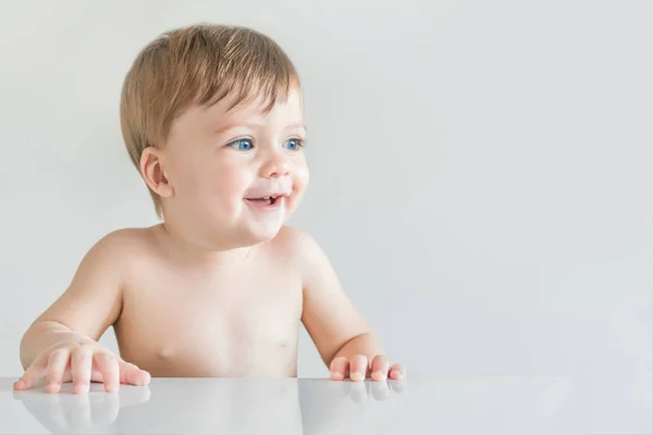 Smiling Blonde Baby Boy Blue Eyes Sitting Table — Stock Photo, Image