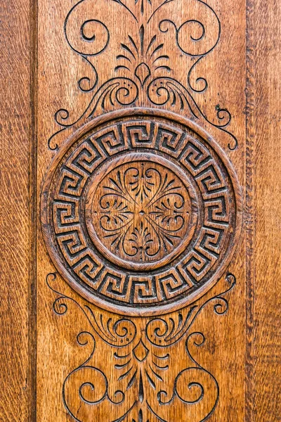 Embossed Ornament Brown Wooden Surface — Stock Photo, Image