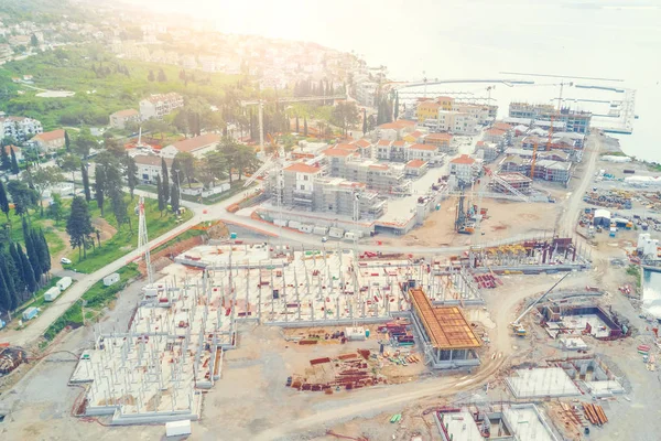 View from the drone of the construction of new houses  by the sea