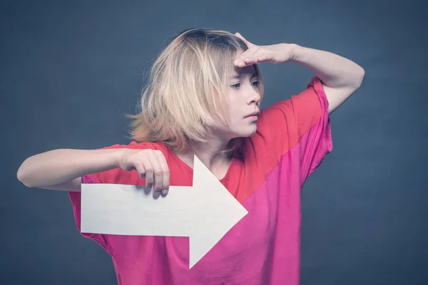 Blonde Girl Teenager Red Blouse Holding White Arrow Pointing Right — Stock Photo, Image