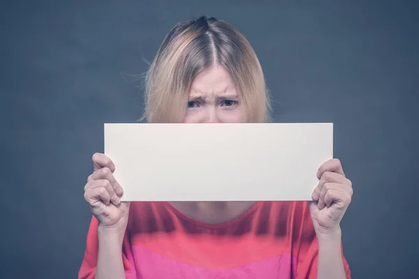 Sad Blonde Girl Teenager Red Blouse Holding Blank White Poster — Stock Photo, Image