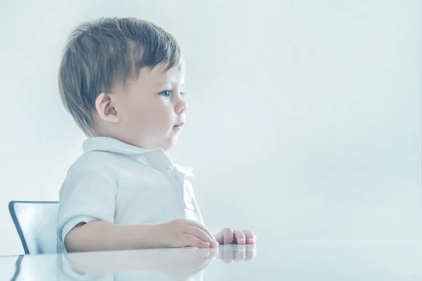 Portrait Blonde Baby Boy Blue Eyes Sitting Table Toned — Stock Photo, Image