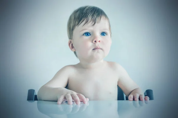 Portrait Blonde Baby Boy Blue Eyes Sitting Table Toned — Stock Photo, Image