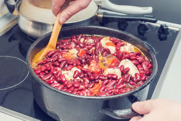 Woman Mixes Red Beans Saucepan Stove — Stock Photo, Image