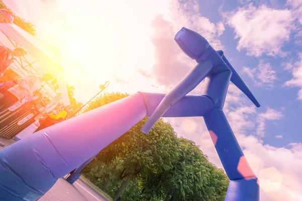 Blue Inflatable Air Dancer outdoors in the sunlight