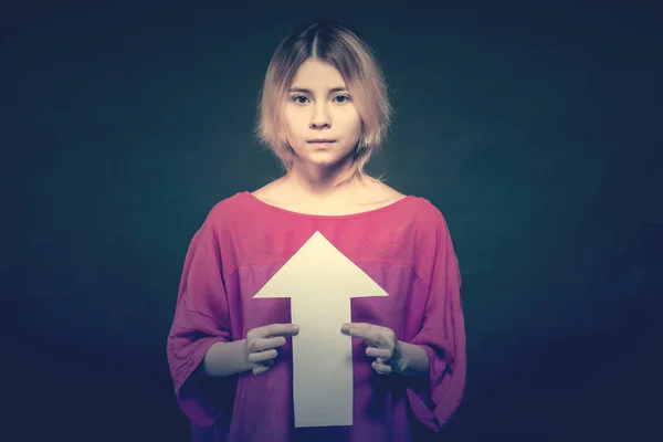 Blonde Girl Teenager Red Blouse Holding White Arrow Pointing Upwards — Stock Photo, Image