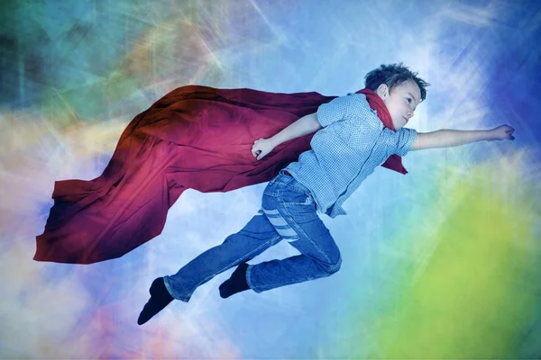 Boy Flying Red Cloak Superhero Multicolor Background — Stock Photo, Image