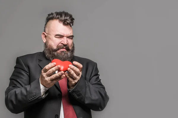 Adult Bearded Man Black Jacket Red Tie Disgust Holding Red — Stock Photo, Image