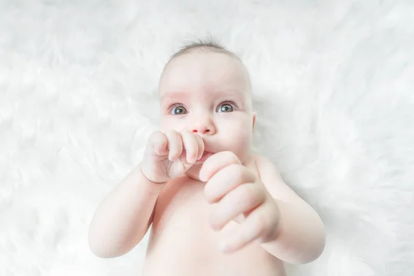 Cute Baby Lying White Fur — Stock Photo, Image