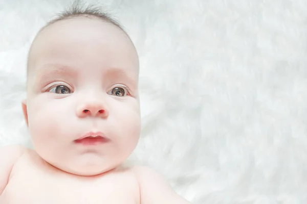 Cute Baby Lying White Fur — Stock Photo, Image