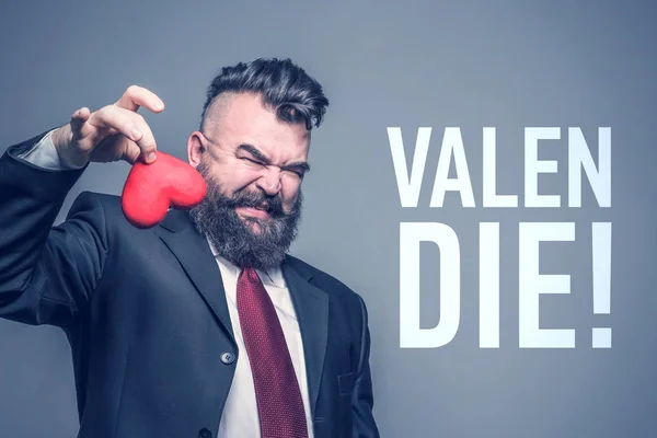 Adult Bearded Man Suit Disgust Holding Red Heart Gray Background — Stock Photo, Image