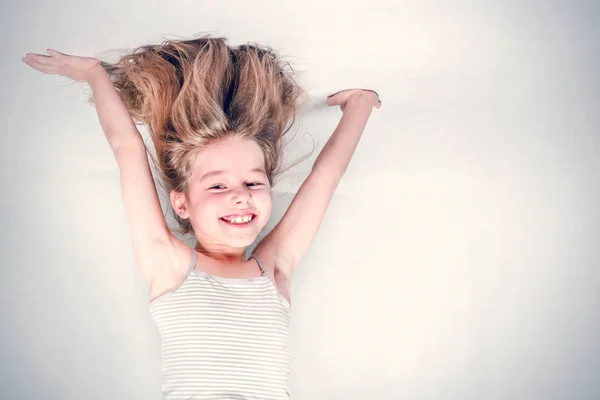 Smiling Little Girl Stands Her Hands Stock Picture